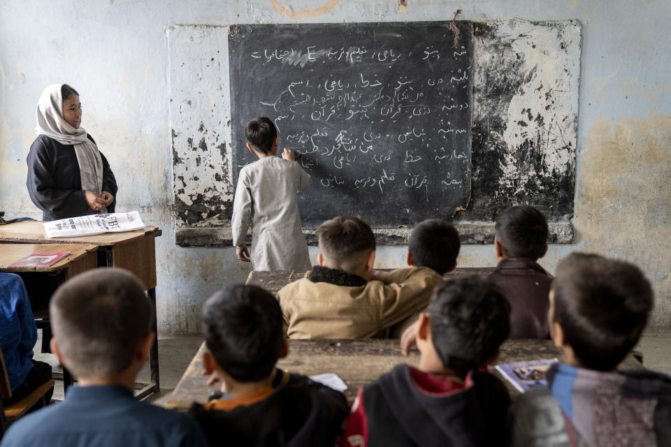 FILE - Afghan school boys attend their classroom on the first day of the new school year, in Kabul, Saturday, March 25, 2023. The Taliban's "abusive" educational policies are harming boys as well as girls in Afghanistan, according to a Human Rights Watch report published Wednesday. (AP Photo/Ebrahim Noroozi, File)