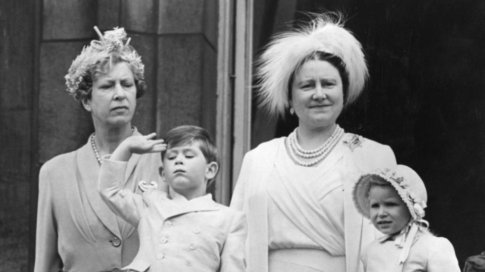 A young Prince Charles saluting the crowd