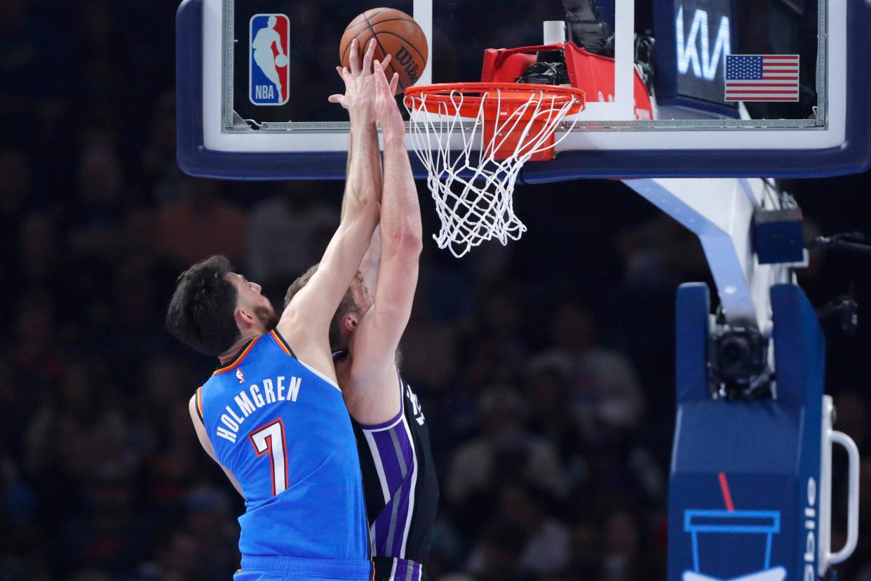 Chet Holmgren blocks the shot of Sacramento Kings forward Domantas Sabonis during a recent NBA basketball game between the Oklahoma City Thunder and the Sacramento Kings at Paycom Center.