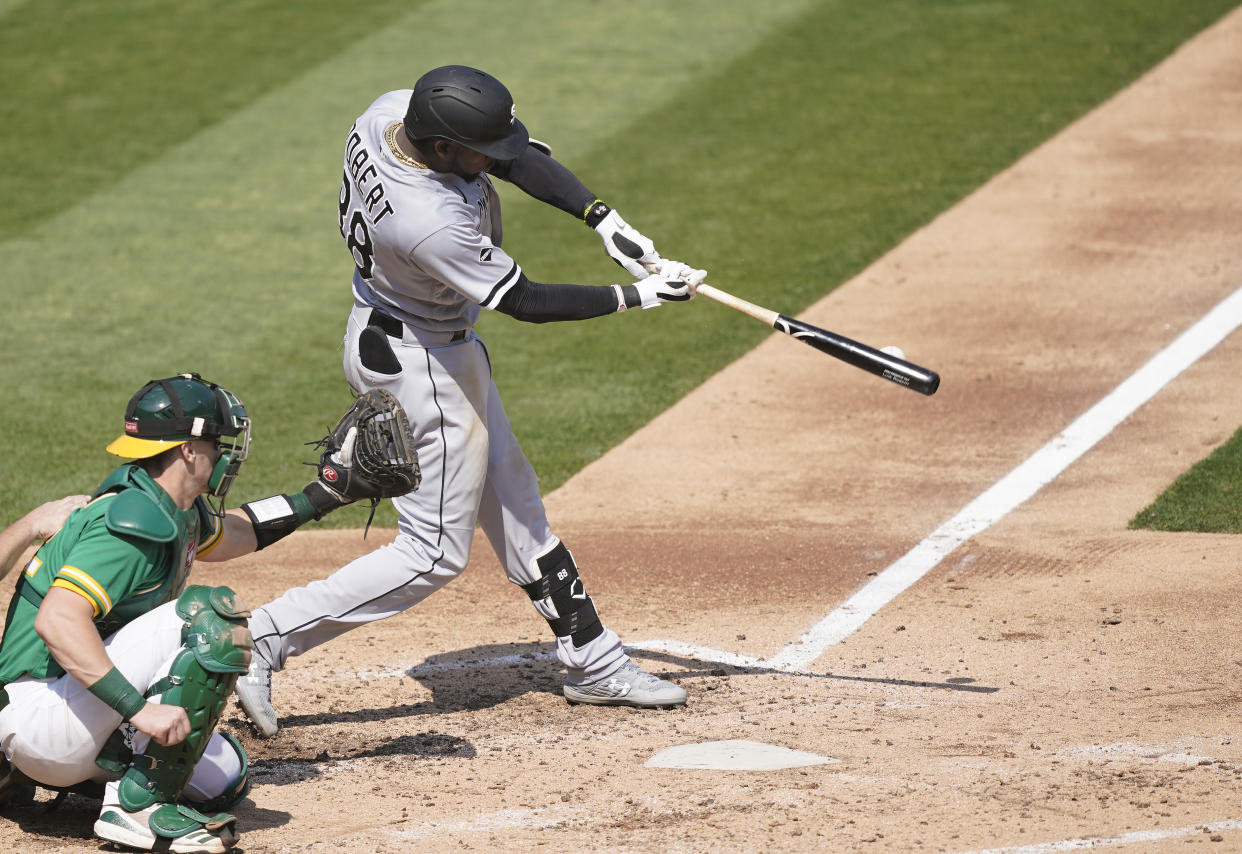 White Sox rookie Luis Robert crushes a 487-foot home run during Game 3 of the wild-card series. (Photo by Thearon W. Henderson/Getty Images)