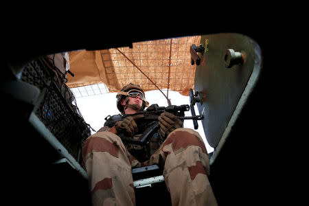 FILE PHOTO: A French soldier patrols in a VAB (Vanguard Armoured Vehicle) during the regional anti-insurgent Operation Barkhane near Tin Hama, Mali, October 20, 2017. REUTERS/Benoit Tessier/File Photo