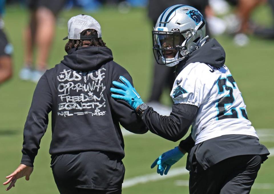 Carolina Panthers cornerback Dane Jackson, right, runs through a drill during the team’s voluntary minicamp practice on Tuesday, April 23, 2024.