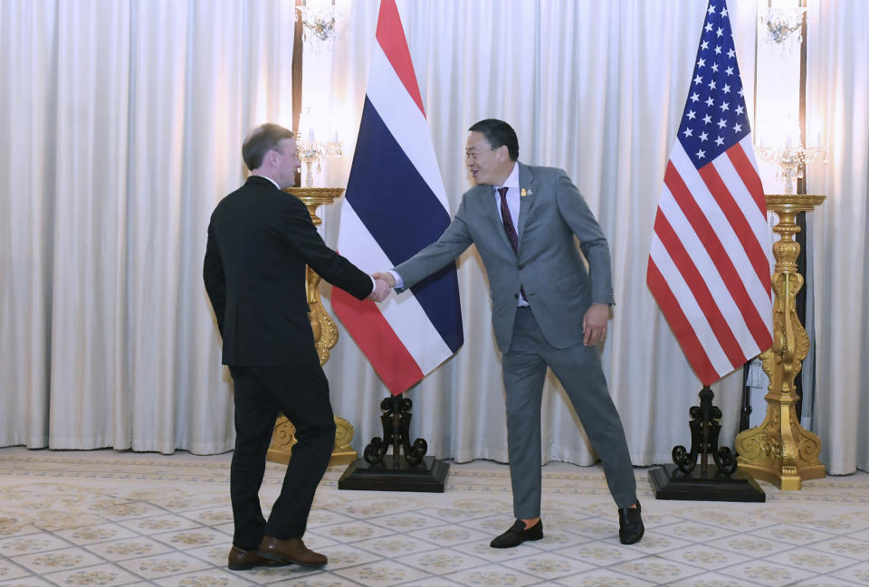 In this photo released by the Government Spokesman Office, U.S. National Security Advisor Jake Sullivan, left, shakes hands with Thailand's Prime Minister Srettha Thavisin at the government house in Bangkok, Thailand, Friday, Jan. 26, 2024. (Government Spokesman Office via AP)