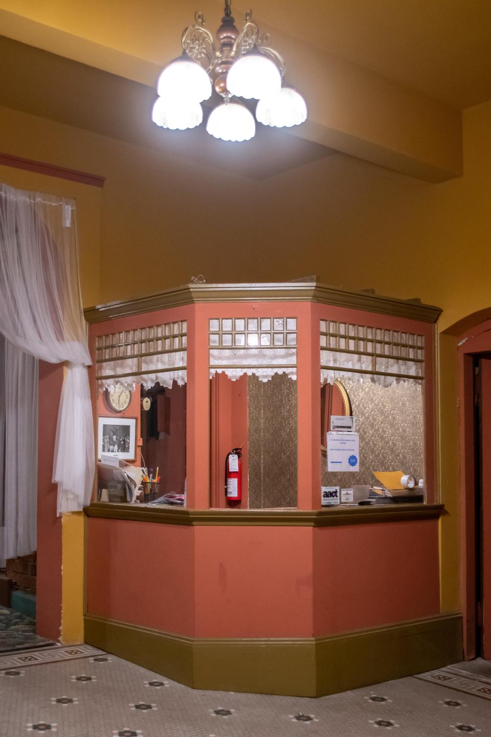 The original box office still stands in the theater lobby of the historic Strand Theater in Cambridge.