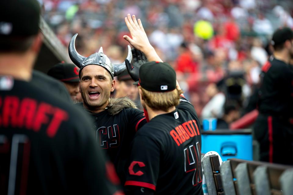 Cincinnati Reds first baseman Joey Votto (19) celebrates after hitting a solo home run in the fourth inning to tie the MLB baseball game between the Cincinnati Reds and the Atlanta Braves 5-5 at Great American Ball Park in Cincinnati on Friday, June 23, 2023.