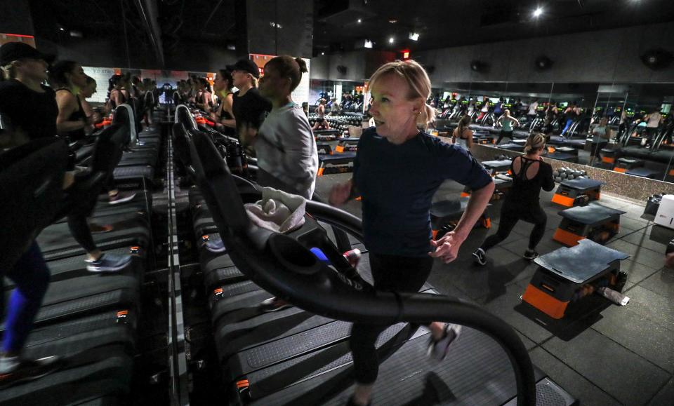 Courier Journal Lifestyle Reporter Kirby Adams works out during a morning session at Shred 4/15.  The workout consists of cardio on treadmills and core/strength training.  The intervals are 15 minutes, each, for an hour.December 18, 2019