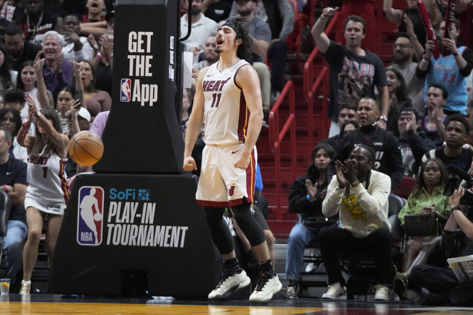 Miami Heat forward Jaime Jaquez Jr. celebrates after a play during the second half of an NBA basketball play-in tournament game against the Chicago Bulls, Friday, April 19, 2024, in Miami. (AP Photo/Wilfredo Lee)