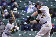 Pittsburgh Pirates' Todd Frazier (99) grounds out to Chicago Cubs' Javier Baez during the ninth inning of a baseball game Friday, May 7, 2021, in Chicago. Colin Moran scored on the play. (AP Photo/Charles Rex Arbogast)