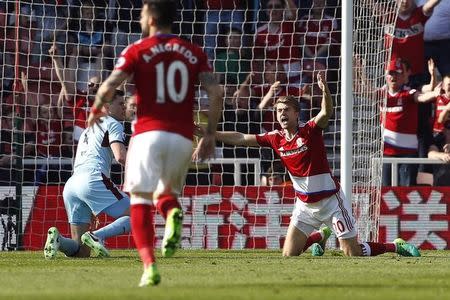 Britain Football Soccer - Middlesbrough v Burnley - Premier League - The Riverside Stadium - 8/4/17 Middlesbrough's Patrick Bamford appeals to the referee after being fouled by Burnley's Michael Keane Action Images via Reuters / Craig Brough Livepic