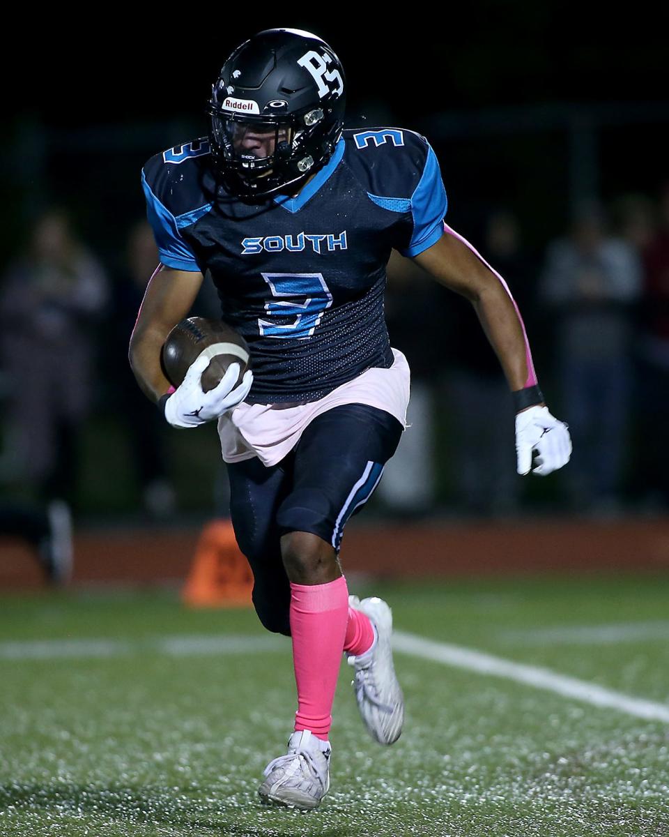 Plymouth South's Justin LaChance runs it back for a touchdown on a kickoff return to cut Scituate’s lead to 34-14 in the second quarter of their game against Scituate at Plymouth South High on Friday, Oct. 14, 2023. Scituate would go on to win 48-21.