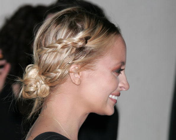 <p>New mum Nicole Richie keeps it casual with a braid and bun combo.</p>