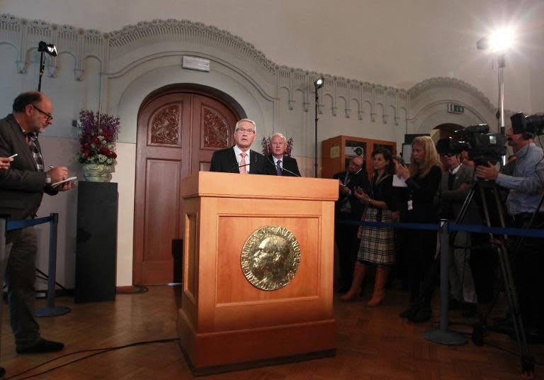 The chairman of the Norwegian Nobel Committee, Thorbjorn Jagland, announces winners of the 2014 Nobel Peace Prize