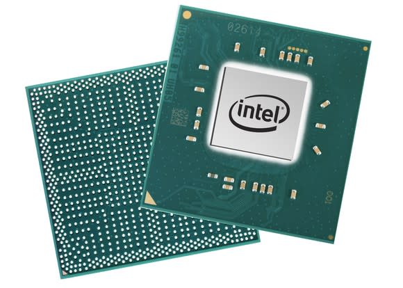 Two of Intel's PC processors with the back side on the left and the front side on the right.