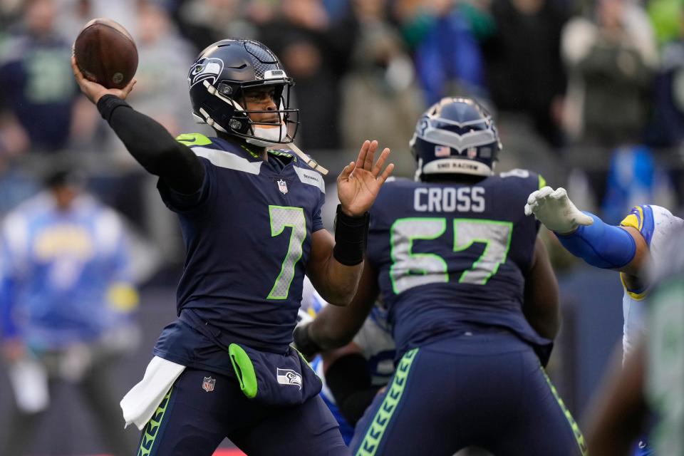 Seattle Seahawks quarterback Geno Smith (7) throws against the Los Angeles Rams during the first half of an NFL football game Sunday, Jan. 8, 2023, in Seattle.