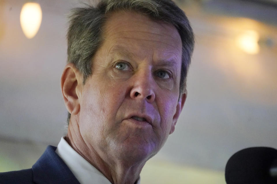 Georgia Gov. Brian Kemp speaks after touring a Bridgestone golfball manufacturing facility Thursday, Nov. 12, 2020, in Covington, Ga. (AP Photo/John Bazemore)