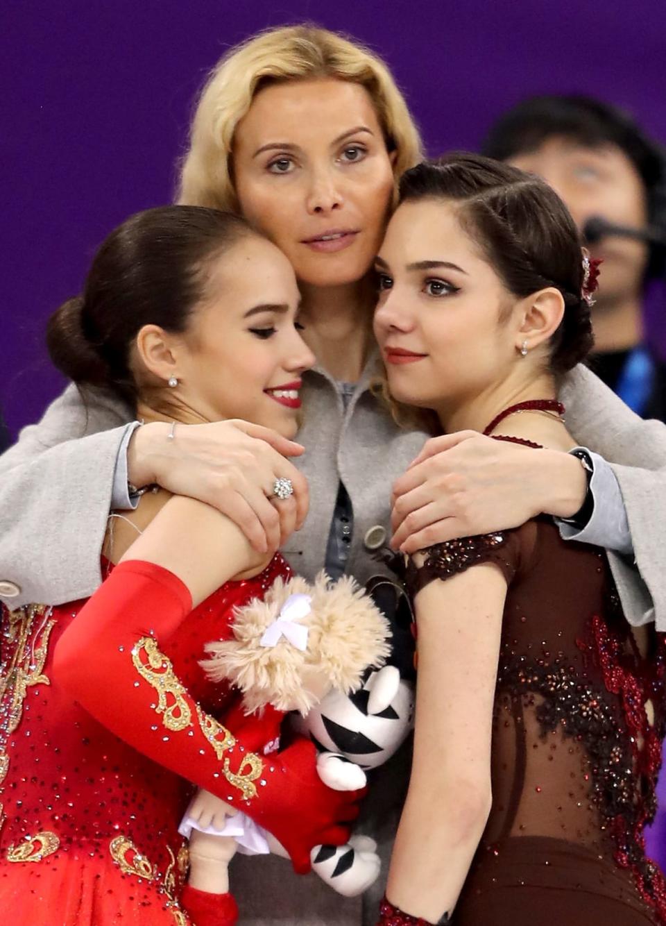 <div class="inline-image__caption"><p>Eteri Tutberidze celebrated winning gold and silver at the 2018 Winter Games with her young stars Alina Zagitova and Evgenia Medvedeva .</p></div> <div class="inline-image__credit">Richard Heathcote/Getty Images</div>