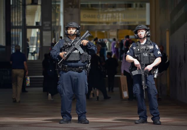 Police in New York City don heavy armour and weapons in wake of Manchester bombing. Source: AP