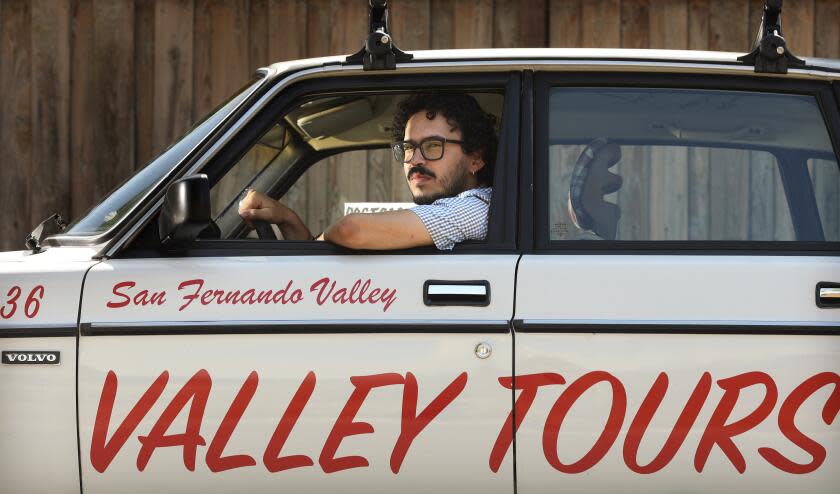 VAN NUYS-CA-AUGUST 7, 2023: Vincent Enrique Hernandez leads super-exclusive "performative" tours, in his Volvo, of the Valley. The off-site tours are part of this year's Hammer Museum biennial. (Christina House / Los Angeles Times)