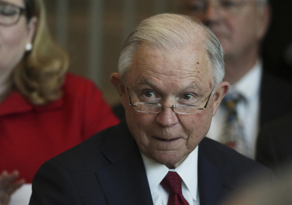 Attorney General Jeff Sessions waits to speak at the dedication for the United States Courthouse for the Southern District of Alabama in Mobile, Ala., on Friday, Sept. 7, 2018. (AP Photo/Dan Anderson)