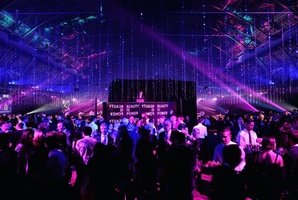 <span class="caption">The Jewish Museum's Purim Ball at the Park Avenue Armory in 2015 in New York City.</span> <span class="attribution"><a class="link " href="https://www.gettyimages.com/detail/news-photo/general-view-of-atmosphere-during-the-jewish-museums-purim-news-photo/464419164?adppopup=true" rel="nofollow noopener" target="_blank" data-ylk="slk:Andrew Toth/Getty Images;elm:context_link;itc:0;sec:content-canvas">Andrew Toth/Getty Images</a></span>