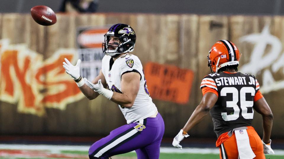 Baltimore Ravens tight end Mark Andrews (89) catches a pass as Cleveland Browns cornerback M.J. Stewart Jr. (36) defends during the first half of an NFL football game, Monday, Dec. 14, 2020, in Cleveland. (AP Photo/Ron Schwane)