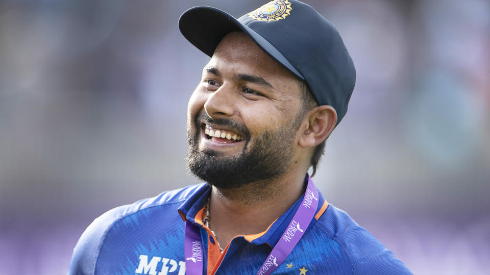 Rishabh Pant smiles during a post-match awards ceremony.