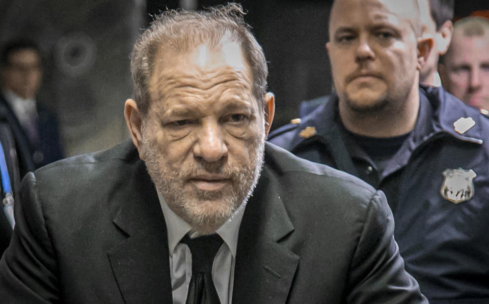 Harvey Weinstein leaves a Manhattan courthouse after a second day of jury selection for his trial on rape and sexual assault charges. (AP Photo/Bebeto Matthews)