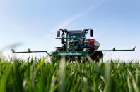 Optical sensors, Trimble Navigation Ltd’s 'GreenSeeker' devices to instantly adjust nitrogen fertilization, are seen installed at a tractor in a wheat field in the Bavarian town of Irlbach near Deggendorf, Germany, April 21, 2016. REUTERS/Michaela Rehle