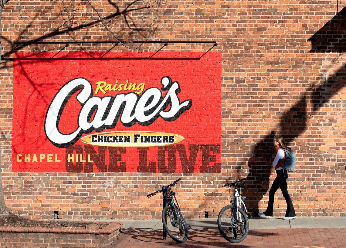 A person walks near the intersection of Columbia and Franklin Streets on Thursday, Jan. 11, 2024, in Chapel Hill, N.C.