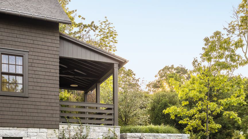 a house with retaining walls and hydrangeas