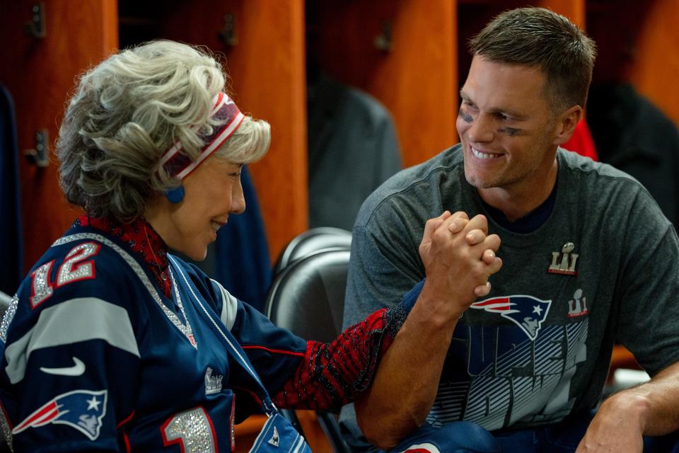 Lou (Lily Tomlin) has a heart-to-heart with her favorite player Tom Brady (as himself) in "80 for Brady."