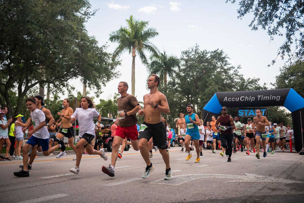 Runners take off during the ninth annual Live Like Jake 5K, held  Saturday in the Abacoa community in Jupiter. About 1,000 people attended the event, which raises funds for self-rescue swim lessons in memory of Jake Morrison, who lost his life in a drowning accident in 2013.