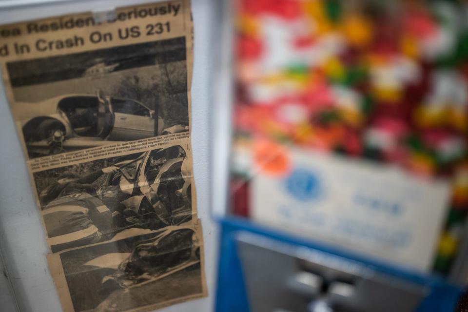 Inside Dan Moon's Cloverdale Barber Shop, a newspaper clipping shows the scene of an accident that involved his wife. 