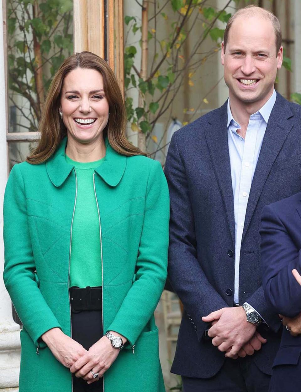 Britain's Prince William, Duke of Cambridge and Britain's Catherine, Duchess of Cambridge pose during their visit to take part in a Generation Earthshot educational initiative comprising of activities designed to generate ideas to repair the planet and spark enthusiasm for the natural world, at Kew Gardens, London on October 13, 2021.