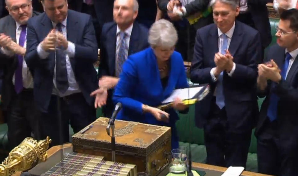 MPs applaud as Prime Minister Theresa May leaves following her final Prime Minister's Questions in the House of Commons, London.