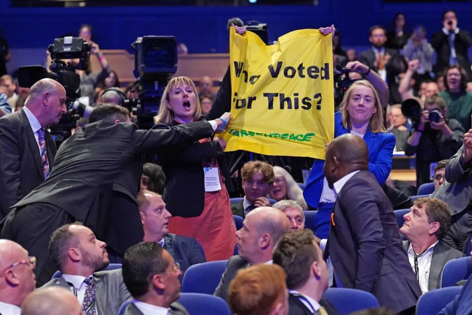 Tolga demonstration during Prime Minister Liz Truss speech during the Conservative Party annual conference at the International Convention Centre in Birmingham (PA)