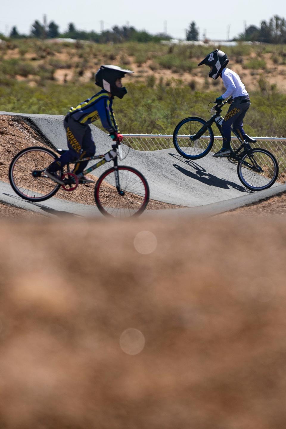 BMX riders enjoy the new BMX Pump Track during its grand opening at the Delores C. Wright Community Center in Chaparral on Thursday, June 30, 2022.  