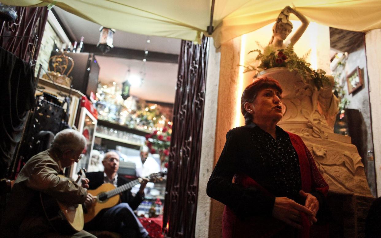 The mournful sound of fado originated in the Alfama neighbourhood - GETTY