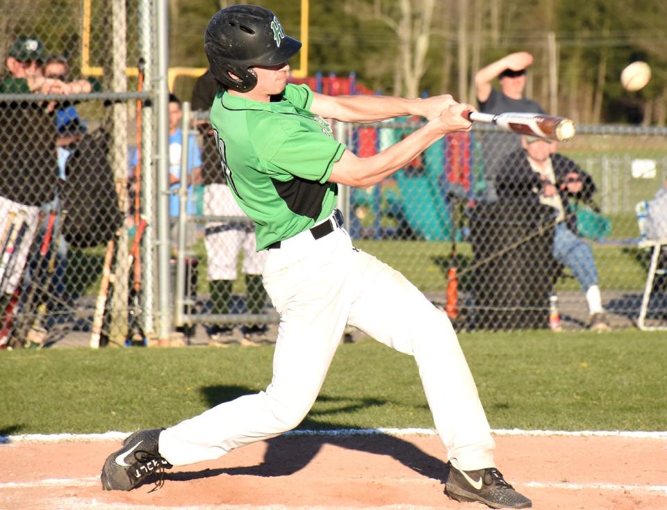 Herkimer Magician Dylan Hart delivers a hit during the sixth inning of Monday's game against Westmoreland.