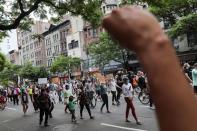 Protestors march against the death in Minneapolis police custody of George Floyd, in New York