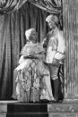 <p>Princess Elizabeth (now Queen Elizabeth II) and Princess Margaret dressed in costume for a performance of "Cinderella" at Windsor Castle.</p>