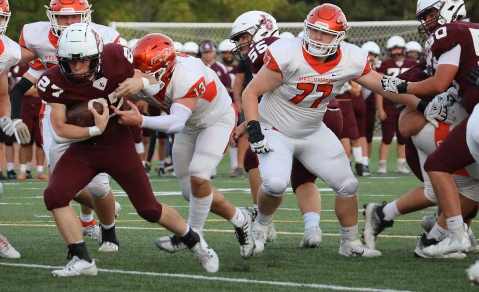 John Glenn's Lincoln Gilcher (27) during the Muskies versus Colts football game at John Glenn High School Friday night.