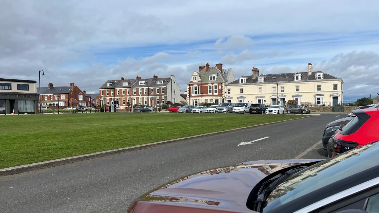 North Street in Seaham with cars parked in front of some posh houses 