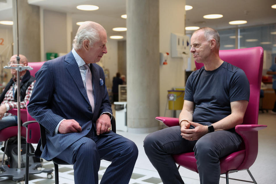 LONDON, ENGLAND - APRIL 30: King Charles III meets with patient Huw Stiley during a visit to the University College Hospital Macmillan Cancer Centre on April 30, 2024 in London, England. (Photo by Suzanne Plunkett - WPA Pool/Getty Images)