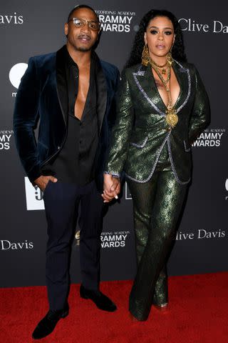 <p>Jon Kopaloff/Getty</p> Stevie J and Faith Evans in February 2019