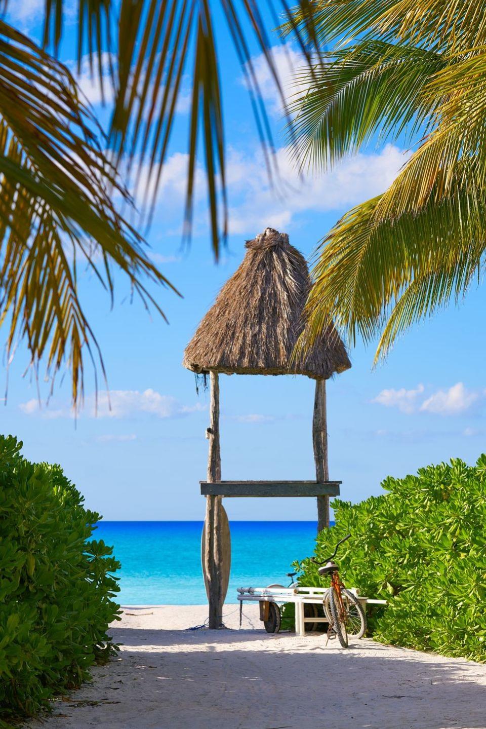 Holbox island palm tree huts Mexico