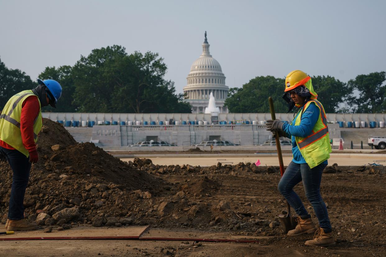 Infrastructure workers near the U.S. Capitol on July 21, 2021.