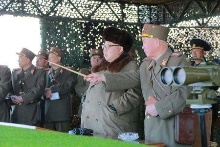 North Korean leader Kim Jong Un watches landing and anti-landing exercises being carried out by the Korean People's Army (KPA) at an unknown location, in this undated photo released by North Korea's Korean Central News Agency (KCNA) in Pyongyang on March 20, 2016. REUTERS/KCNA