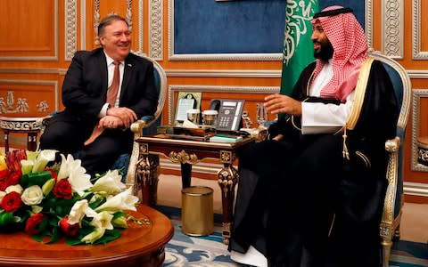 US Secretary of State Mike Pompeo (L) meets with Saudi Crown Prince Mohammed bin Salman in Riyadh, on October 16, 2018 - Credit: AFP