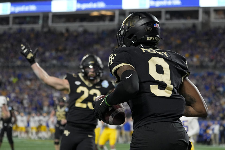 Wake Forest wide receiver A.T. Perry celebrates after scoring against Pittsburgh during the first half of the Atlantic Coast Conference championship NCAA college football game Saturday, Dec. 4, 2021, in Charlotte, N.C. (AP Photo/Chris Carlson)